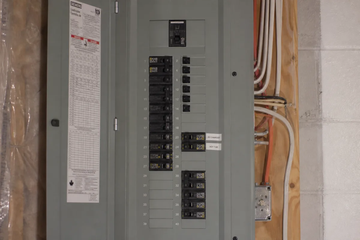 Modern 200-amp breaker panel with room for additional circuits in a Springdale, Brampton basement