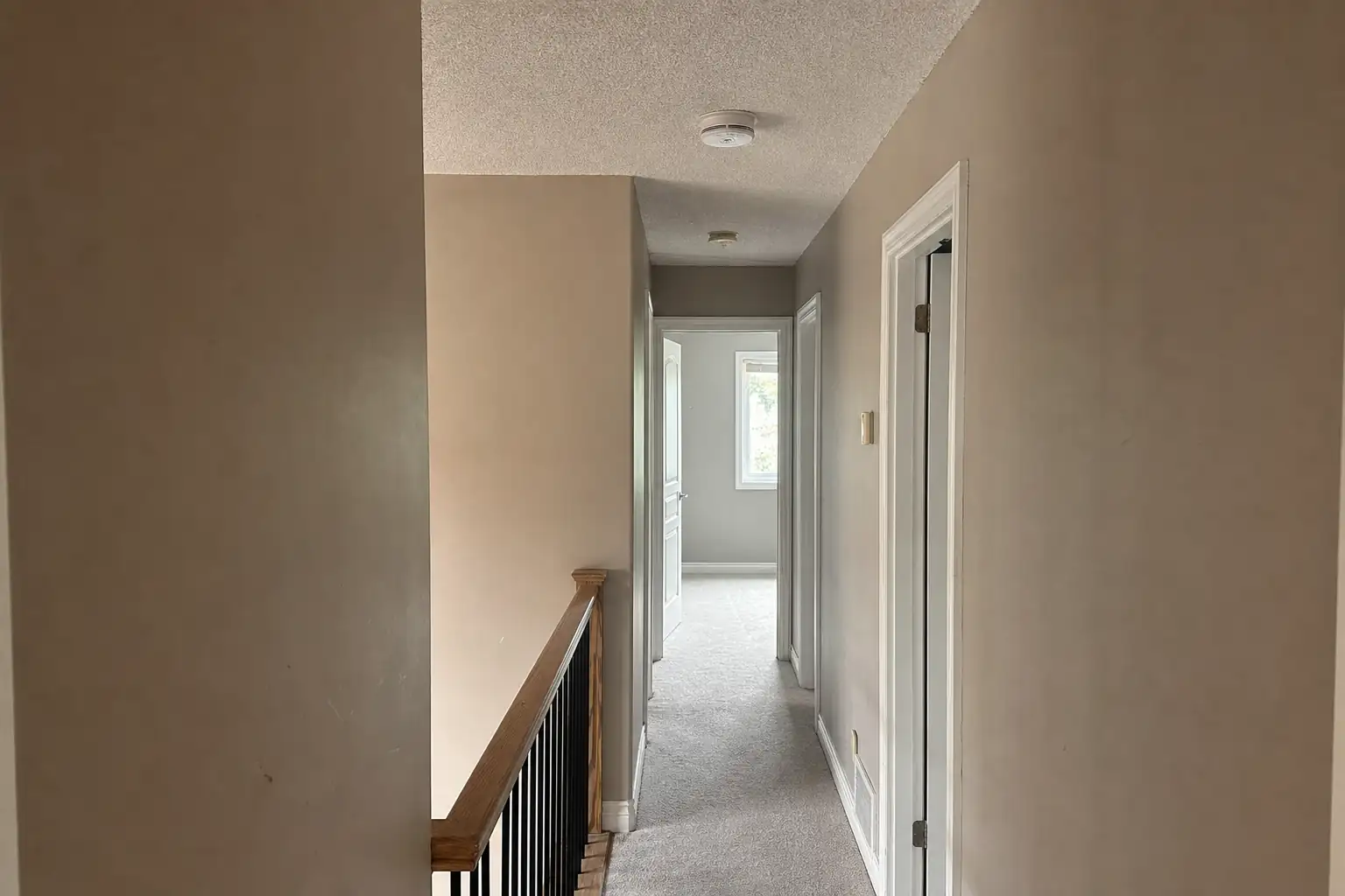 Interconnected alarms along an upstairs hallway