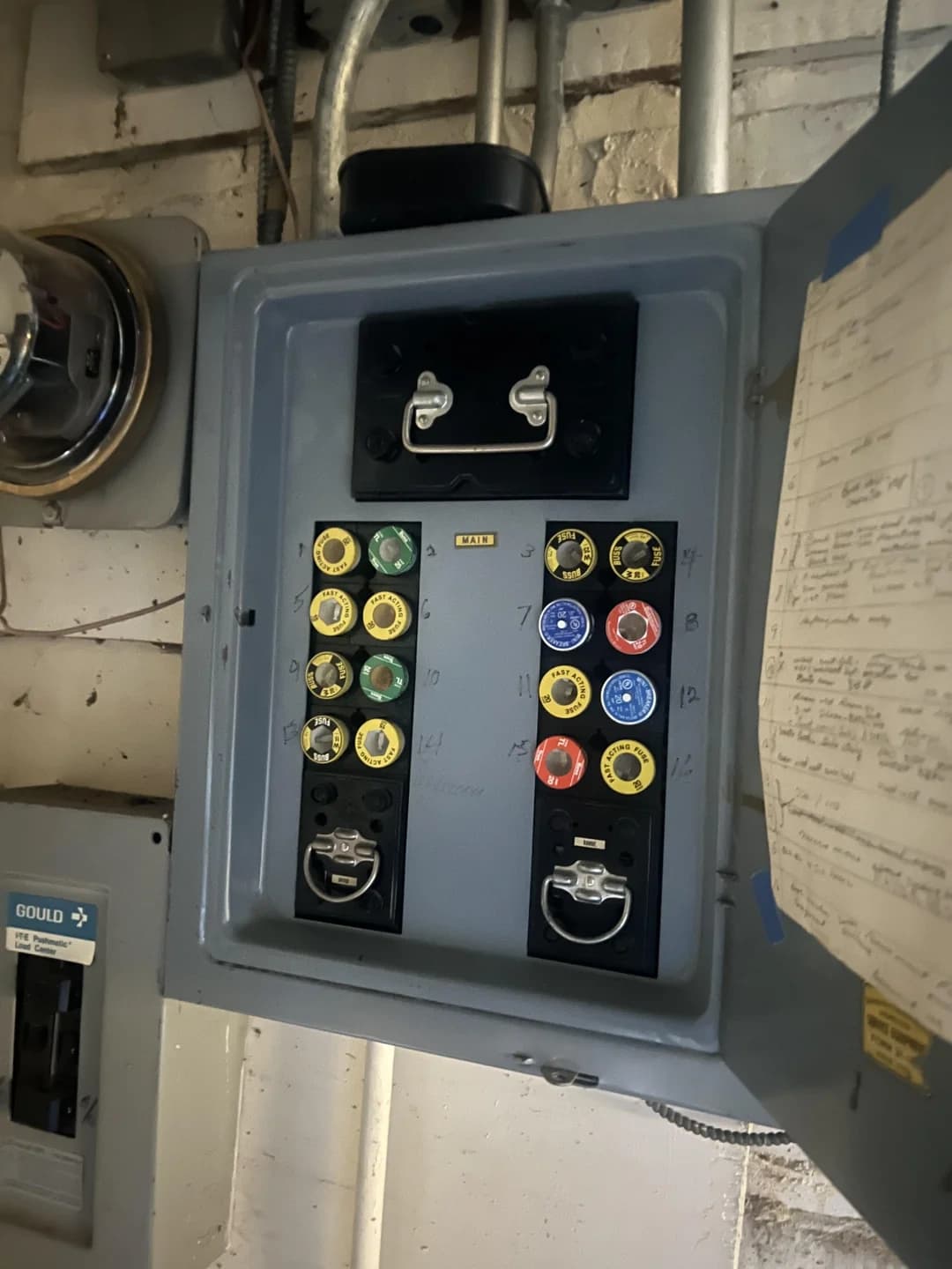 Old Gould fuse panel with colorful fuses during K&T removal