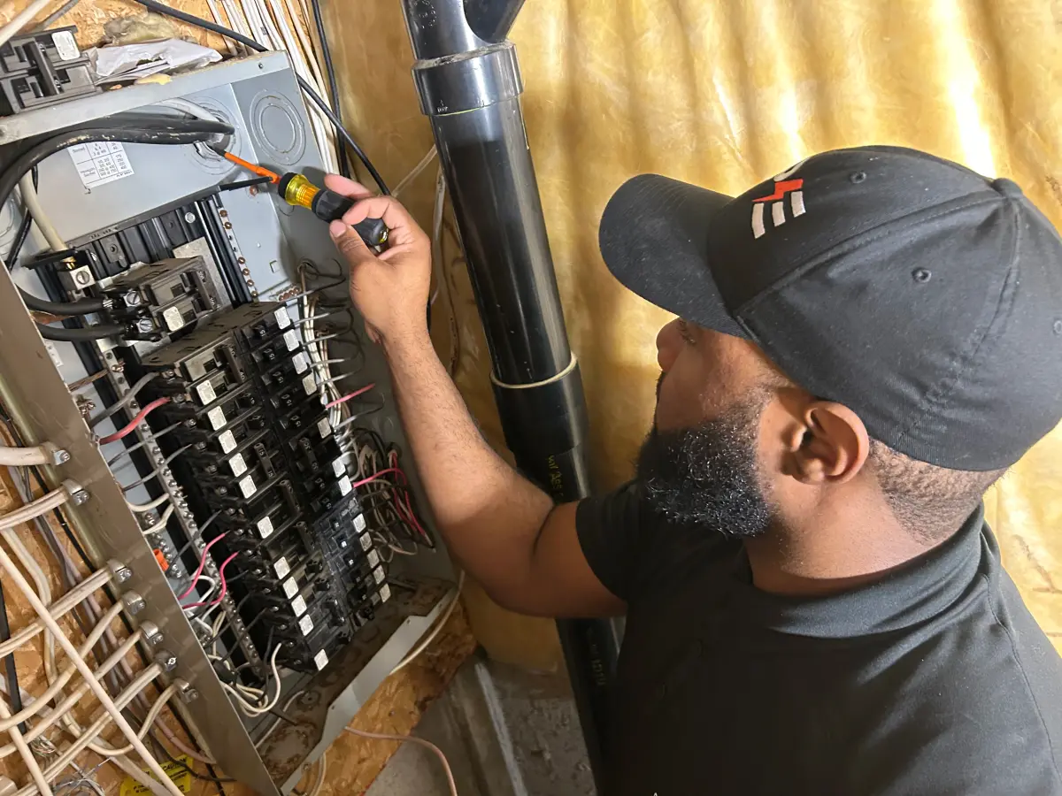 Shaun working on electrical panel upgrade